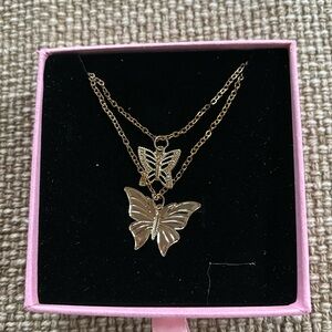 Plastic!! Gold butterfly necklace
